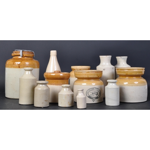 1157a - A collection of vintage 20th Century two tone stoneware lidded jars and bottles. Some white vase / b... 