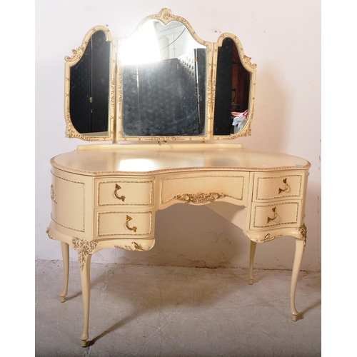 1159 - A 20th century Louis XV style painted dressing table having a glass top with moulded detailing on ed... 