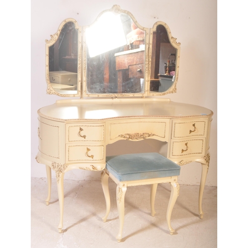 1159 - A 20th century Louis XV style painted dressing table having a glass top with moulded detailing on ed... 