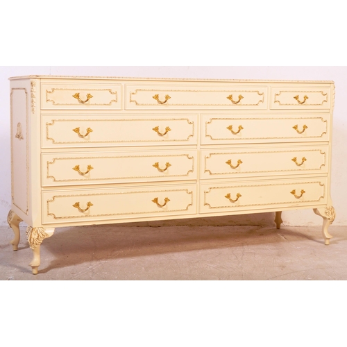 1160 - A 20th century Louis XV style painted sideboard credenza. The chest of drawers having a glass top wi... 