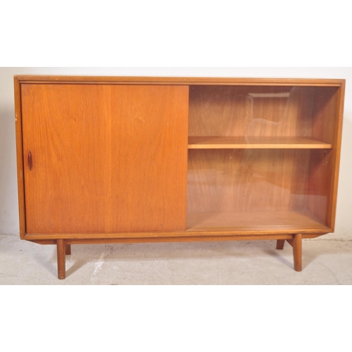 1161 - A retro vintage mid 20th century circa 1960s teak wood side glazed display cabinet bookcase having s... 