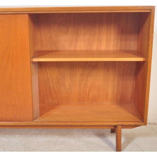 1161 - A retro vintage mid 20th century circa 1960s teak wood side glazed display cabinet bookcase having s... 