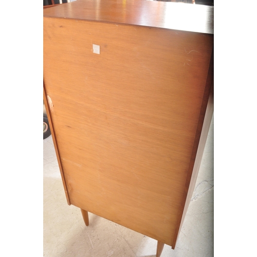 1165 - Austin Suite  - A vintage retro mid 20th century circa. 1960's teak wood chest of drawers having a b... 