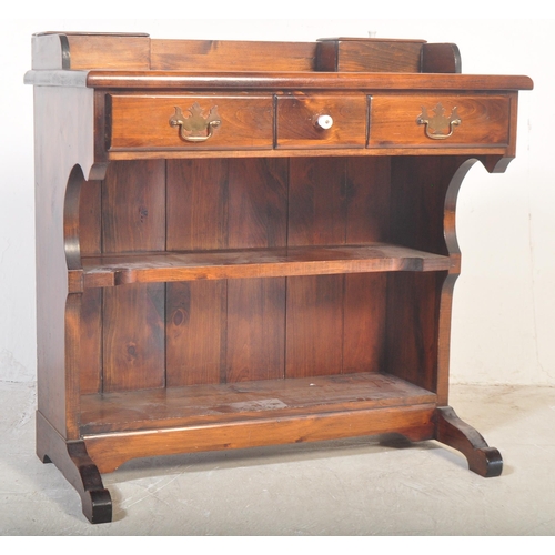 1169 - A vintage 20th century country pine revival writing table desk. Single drawer to the frieze, over op... 