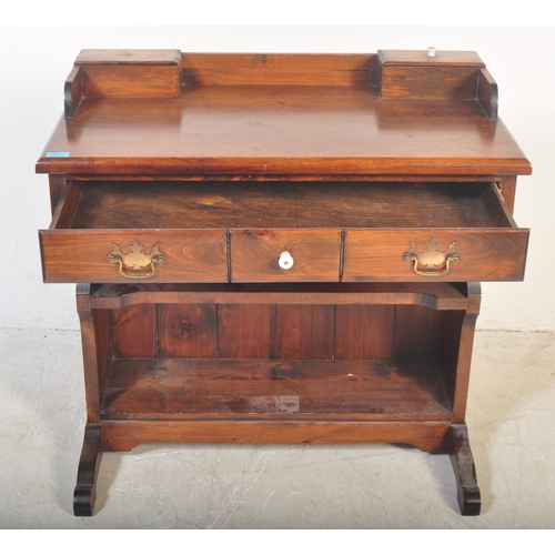 1169 - A vintage 20th century country pine revival writing table desk. Single drawer to the frieze, over op... 