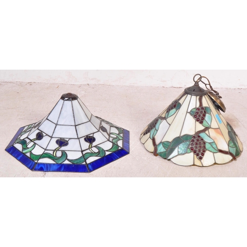 1171 - Two 20th century Tiffany conical style ceiling lamp shades having a lead & glass body construction.