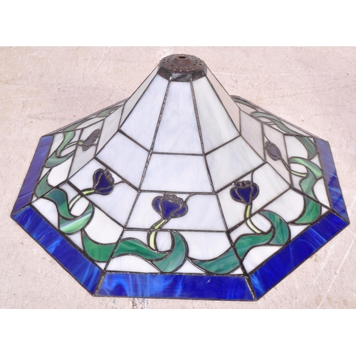 1171 - Two 20th century Tiffany conical style ceiling lamp shades having a lead & glass body construction.