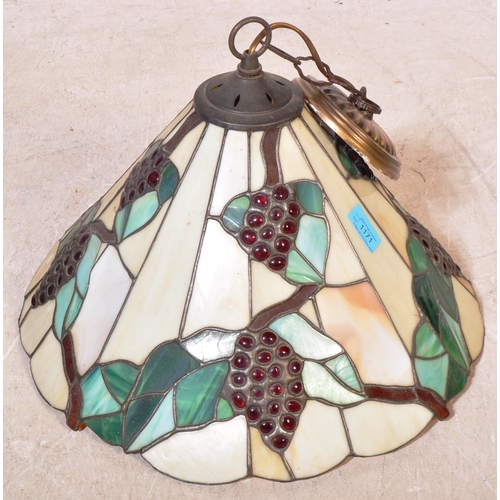 1171 - Two 20th century Tiffany conical style ceiling lamp shades having a lead & glass body construction.