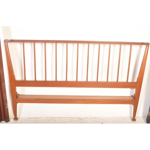 1173 - A 1960's mid century teak double bed frame by Loughborough Furniture and retailed by Heals, London. ... 