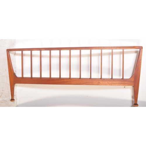 1173 - A 1960's mid century teak double bed frame by Loughborough Furniture and retailed by Heals, London. ... 