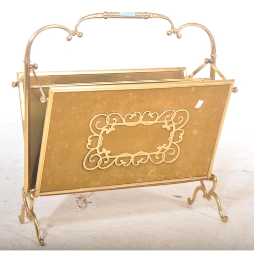 1176 - Mid-century brass magazine rack - canterbury stand. Rococo scroll worked brass frame  and feet with ... 