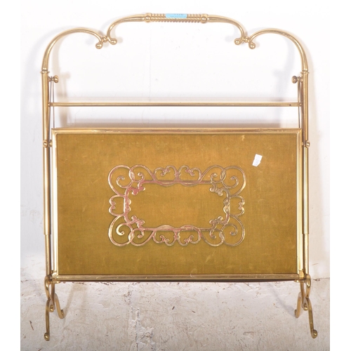 1176 - Mid-century brass magazine rack - canterbury stand. Rococo scroll worked brass frame  and feet with ... 