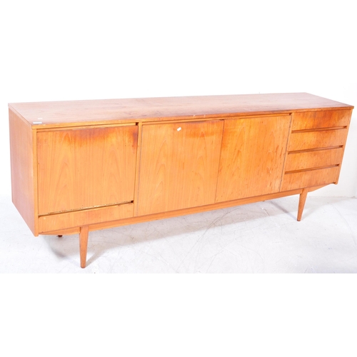 1177A - A vintage mid 20th Century teak wood side board. The sideboard having a central pair of sliding door... 