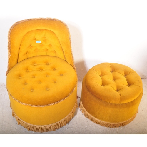 1180 - A 20th century vintage circular button back boudoir armchair raised on castors, covered in a velour ... 