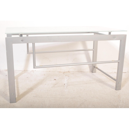 1181 - A retro vintage 20th Century metal and glass coffee / occasional table. Of rectangular form with tra... 