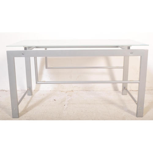 1181 - A retro vintage 20th Century metal and glass coffee / occasional table. Of rectangular form with tra... 