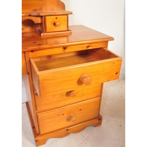 1182 - A retro vintage 20th Century pine bedroom suite. Comprising of; two bed side tables / cabinets with ... 