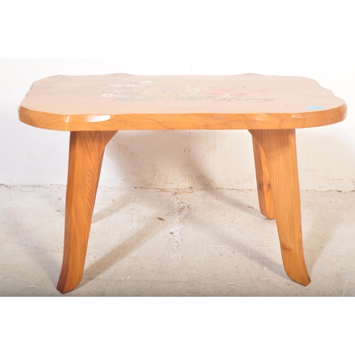 1183 - A retro vintage 20th Century pine coffee / occasional table. Having a curved 'living edge' style han... 