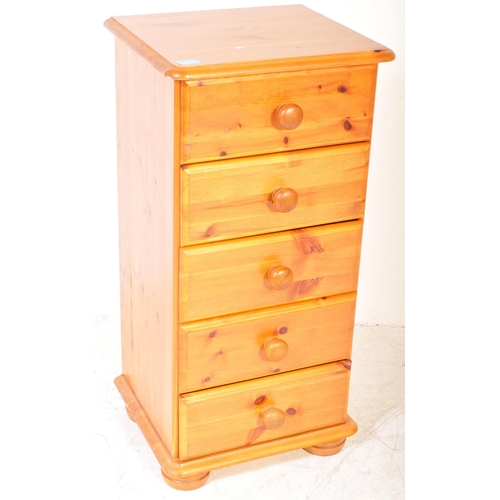 1187A - A 20th Century pine pedestal chest of drawers. The drawers having a bank of five drawers each with t... 