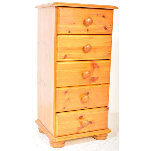 1187A - A 20th Century pine pedestal chest of drawers. The drawers having a bank of five drawers each with t... 