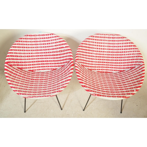 1193 - A pair of retro vintage 20th Century wicker cane satellite chairs in the manner of Franco Albini. Th... 