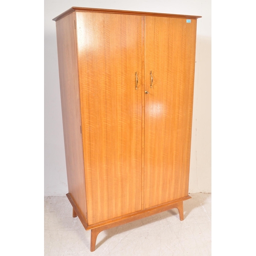 1194 - British Modern Design  - Mid century walnut Alfred Cox for AC Furniture single wardrobe armoire. Rai... 