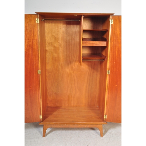 1194 - British Modern Design  - Mid century walnut Alfred Cox for AC Furniture single wardrobe armoire. Rai... 