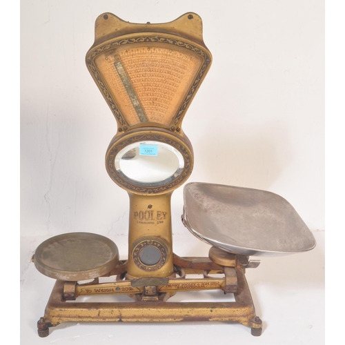 1201 - Pooley & Sons - A large set of mid 20th Century shop scales finished in gold tones with makers marks... 