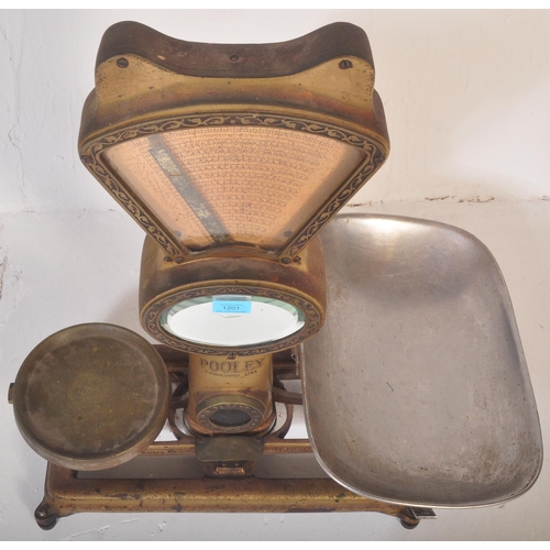 1201 - Pooley & Sons - A large set of mid 20th Century shop scales finished in gold tones with makers marks... 