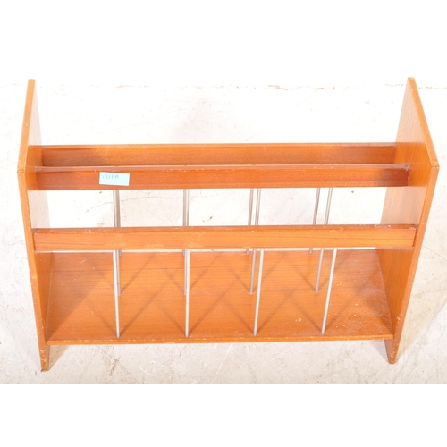 1217A - A vintage mid 20th Century1970's  teak wood magazine rack. The rack having three sections with wire ... 