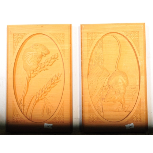 1237a - A contemporary pine wood carved wall hanging mounted plaque. Depicting squirrels sat on a branch for... 