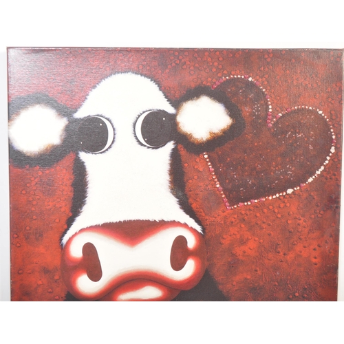 1245 - Caroline Shotton - A signed limited edition print featuring a cow and a love heart on a red back gro... 