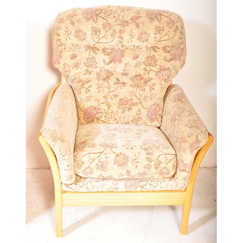 1247A - A vintage retro Ercol Renaissance model living room suite. The lot to include an armchair and three ... 