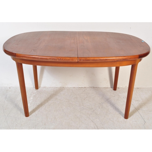 1247 - A retro vintage mid 20th century teak wood extendable dining table of oval form with flared chamfere... 