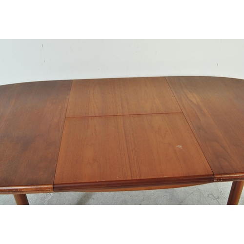 1247 - A retro vintage mid 20th century teak wood extendable dining table of oval form with flared chamfere... 