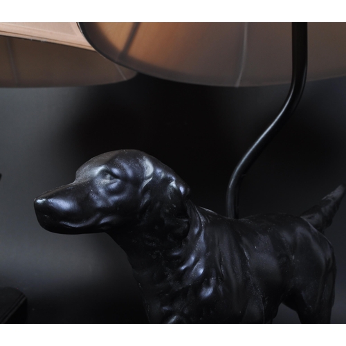 1256a - Two large table lamp / desk lamps in the form of striding dogs. Resin construction mounted on a base... 