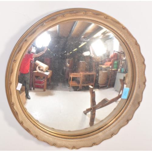 1262 - A vintage 20th century circa. 1940's wall fish eye - convex  mirror of circular form having pie crus... 