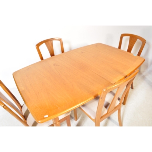 1270a - A vintage mid Century teak Meredew dining table and x6 chairs. The extending table of rectangular ov... 