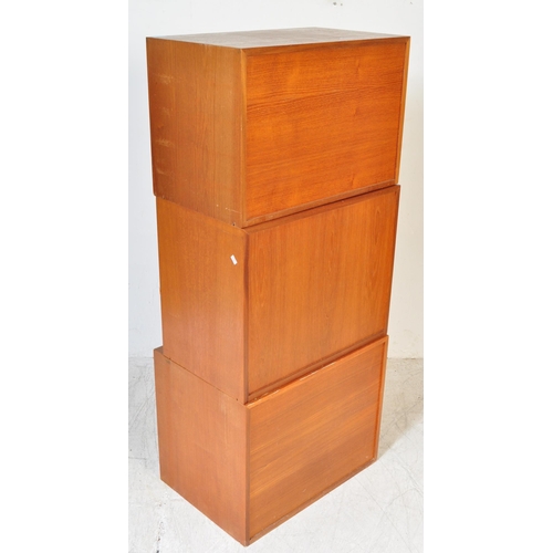 1277a - Mid-Century teak wood selection of modular wall units in the manner of Avalon / Ladderax. Comprising... 