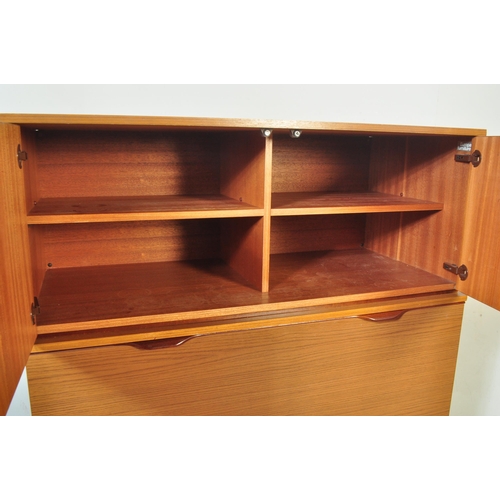 1280 - Europa Furniture - A retro vintage mid 20th century circa 1950s British teak wood Europa kitchen cab... 