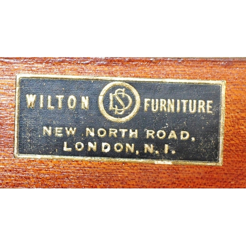 1283 - Wilton Furniture - An early 20th century circa. 1930's Art Deco era walnut bachelors wardrobe and dr... 