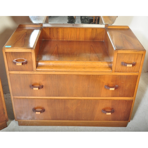 1283 - Wilton Furniture - An early 20th century circa. 1930's Art Deco era walnut bachelors wardrobe and dr... 