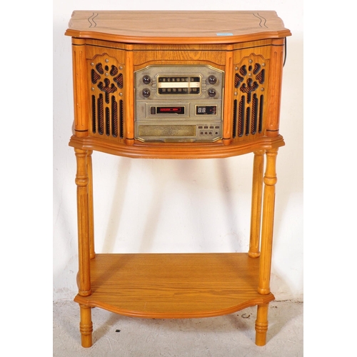 1284 - A vintage 20th century pine Canterbury cassette and CD player phonograph with radio /  stereogram wi... 