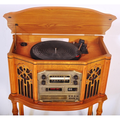 1284 - A vintage 20th century pine Canterbury cassette and CD player phonograph with radio /  stereogram wi... 