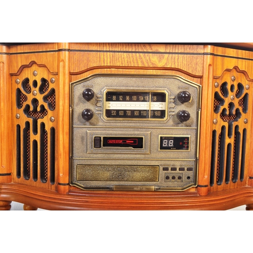 1284 - A vintage 20th century pine Canterbury cassette and CD player phonograph with radio /  stereogram wi... 