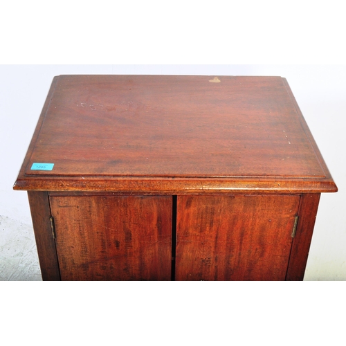 1285 - A vintage retro 20th century circa. 1940's mahogany music cabinet having chamfered top with hinged l... 