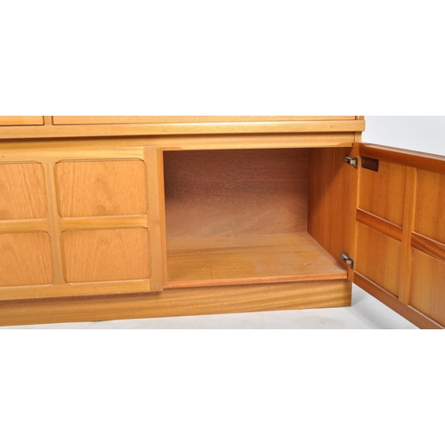 1291 - Nathan - Squares Pattern - A retro 20th Century teak highboard / sideboard credenza having a central... 