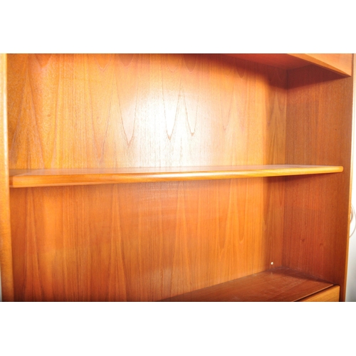 1293 - A vintage retro 20th century circa 1970s teak wood veneer wall unit / bookcase cabinet by Nathan in ... 