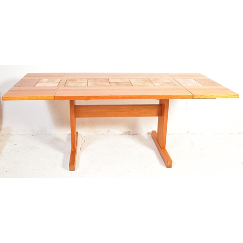 1300 - Gangso Mobler - A vintage retro mid 20th century circa. 1960's teak tile top dining table. The table... 