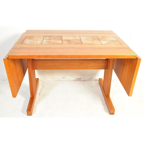 1300 - Gangso Mobler - A vintage retro mid 20th century circa. 1960's teak tile top dining table. The table... 